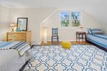 Upper bedroom with double bed w/ trundle & twin bed w/ trundle